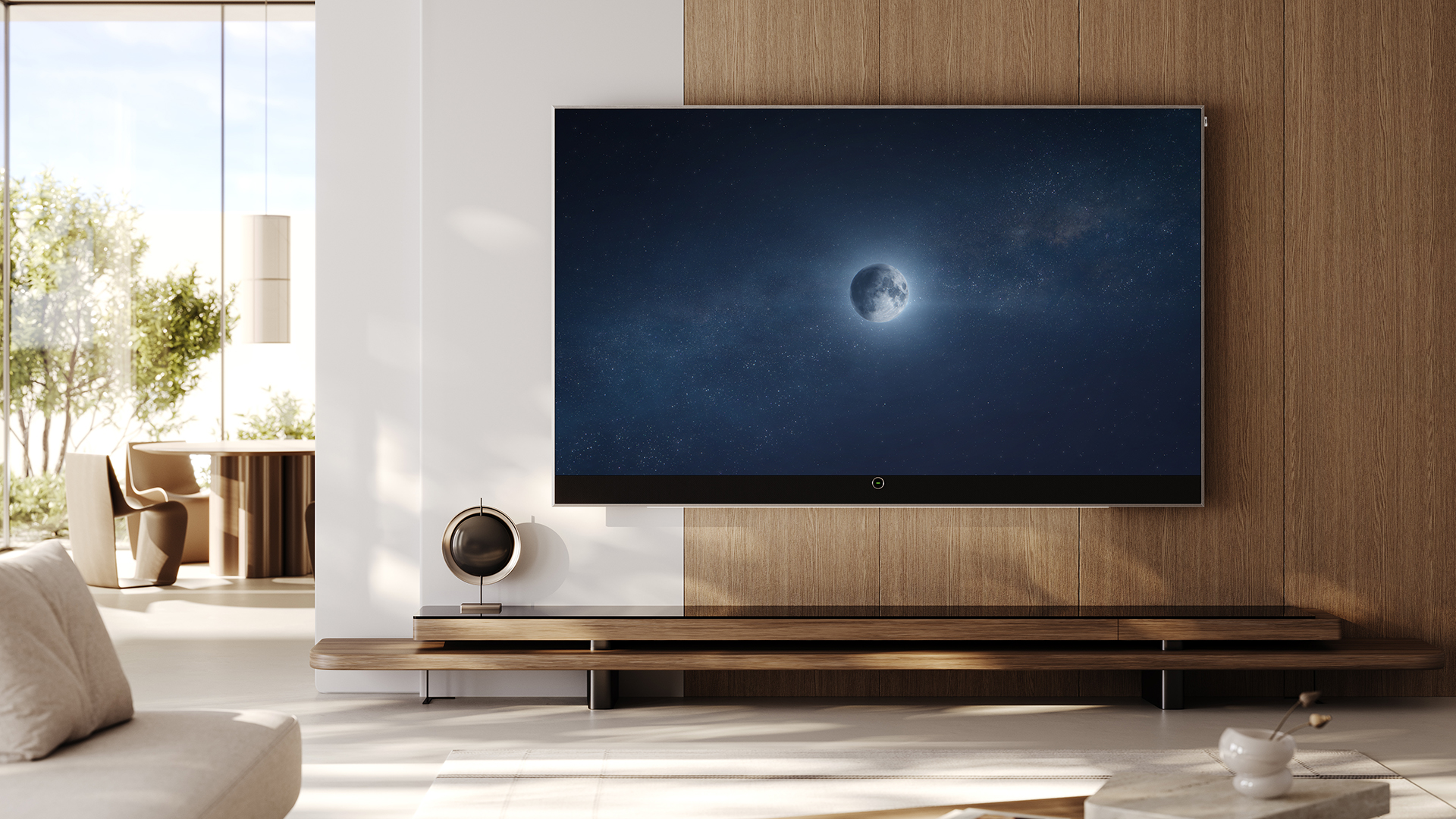 Loewe Stellar 97-inch OLED TV hanging on wall in brightly lit living room