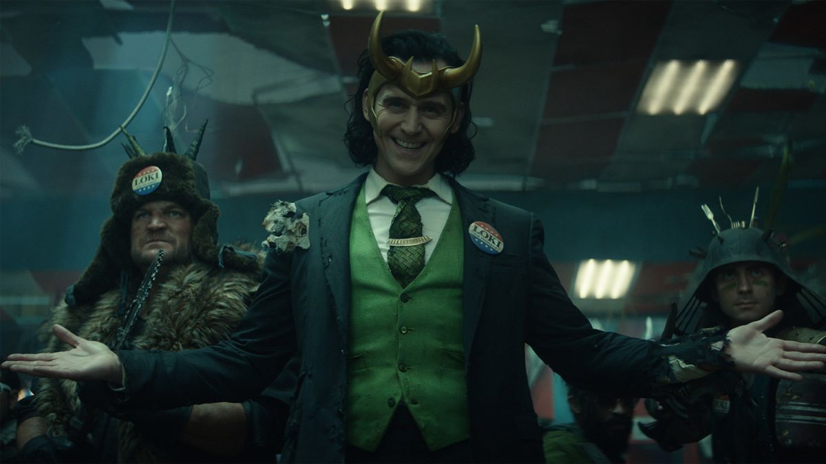 Tom Hiddleston&#039;s President Loki smiles in Loki season 1 on Disney Plus