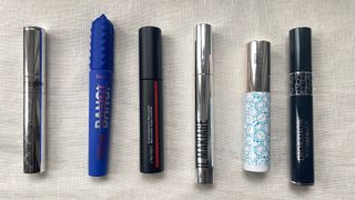 Flatlay of blue mascaras from By Terry, Benefit, Shiseido, Il Makiage, Ciate London and Dior