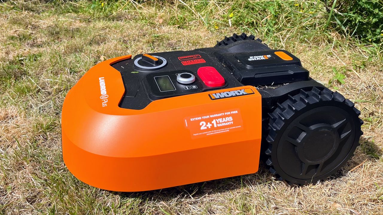 Worx WR165 20-Volt 7 in. 2.0 Ah Robotic Landroid Mower being tested in writer's yard