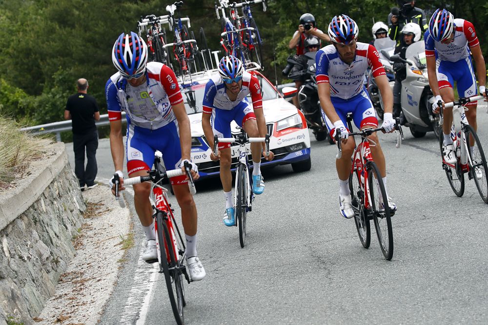 Groupama-FDJ teammates surround Thibaut Pinot as he struggles during stage 20 at the Giro