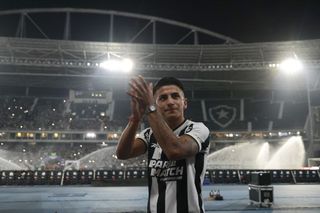 Thiago Almada waves fans during his unveiling as new player of Botafogo prior to the match between Botafogo and Atletico Mineiro as part of Brasileirao 2024 at Estadio Olimpico Nilton Santos on July 7, 2024 in Rio de Janeiro, Brazil.