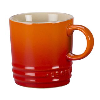 A Le Creuset espresso mug in flame