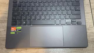 Asus ROG Zephyrus G14 keyboard dek on a desk
