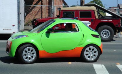 Obvio car in green and orange coloured