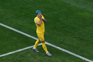 Romania player with blue hair
