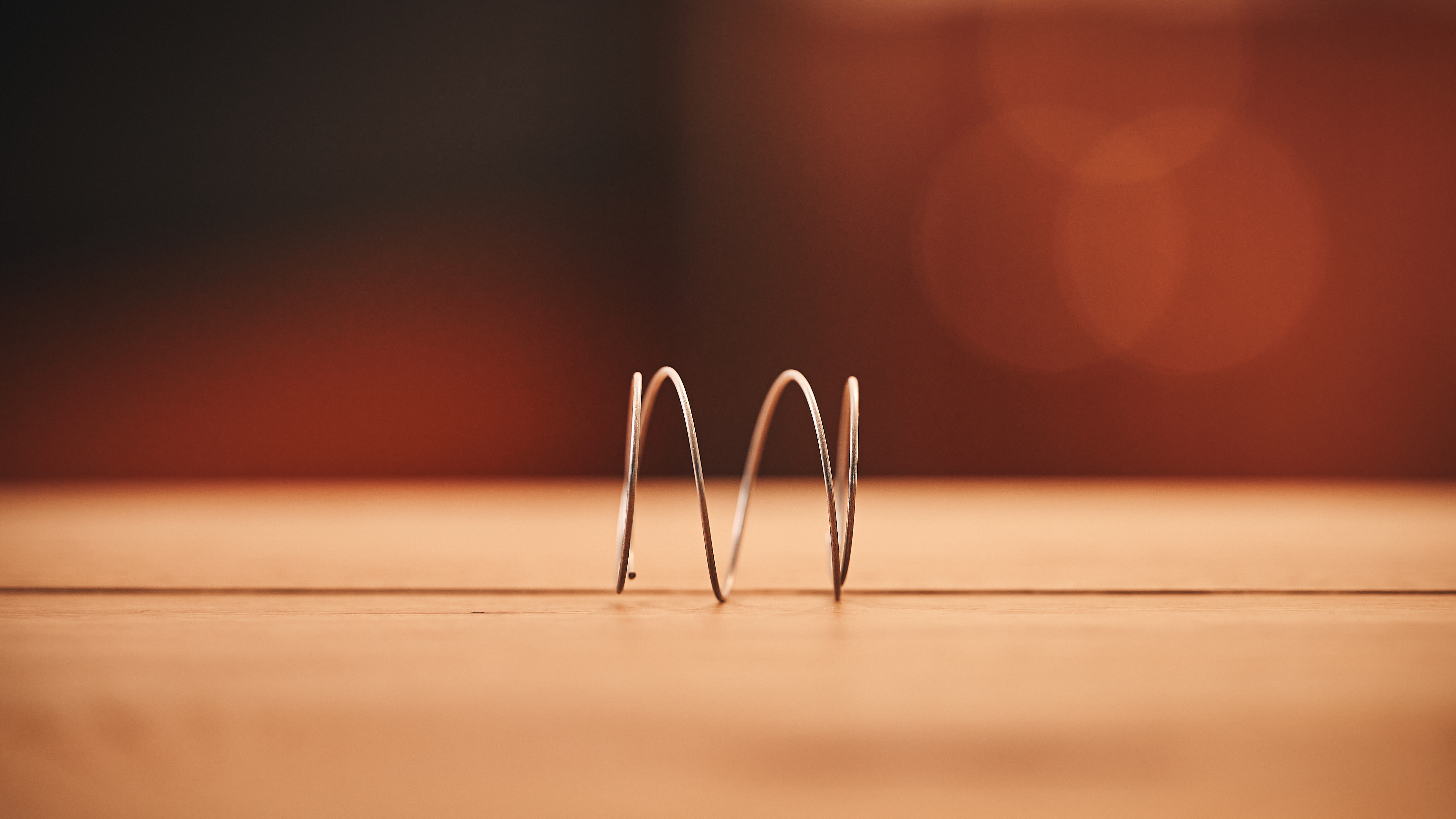 A close-up shot of a mattress coil