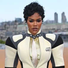 Teyana Taylor attends a One Battle After Another press tour event in a sporty skirt set
