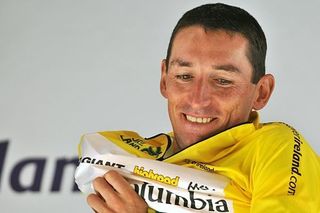 A happy Marco Pinotti (Team Columbia) receives the final yellow