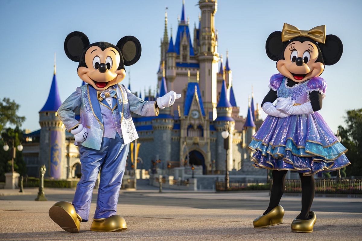 Beginning Oct. 1, 2021, Mickey Mouse and Minnie Mouse will host “The World’s Most Magical Celebration” honoring Walt Disney World Resort’s 50th anniversary in Lake Buena Vista, Fla. They will dress in sparkling new looks custom made for the 18-month event, highlighted by embroidered impressions of Cinderella Castle on multi-toned, EARidescent fabric punctuated with pops of gold. 