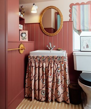 Small bathroom with pink painted wall paneling
