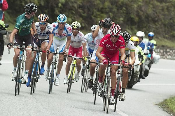 A group of eight riders had broken clear nearing the base of the first KOM climb at Pos Slim.