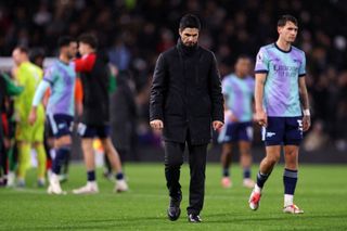 Mikel Arteta, Manager of Arsenal, shows dejection after the Premier League match between Fulham FC and Arsenal FC at Craven Cottage on December 08, 2024 in London, England.