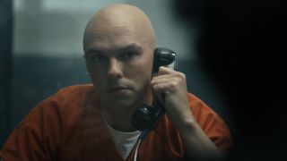 Lex Luthor speaking to Rick Flag Sr. from prison phone in Peacemaker Season 2