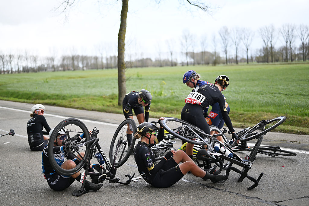 Seven riders on the ground after a crash