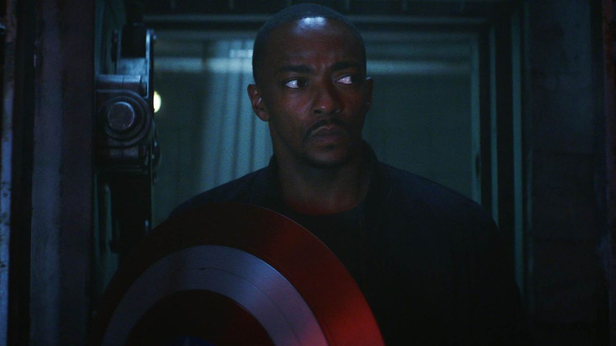 Sam Wilson in a dark room holding shield in Captain America: Brave New World