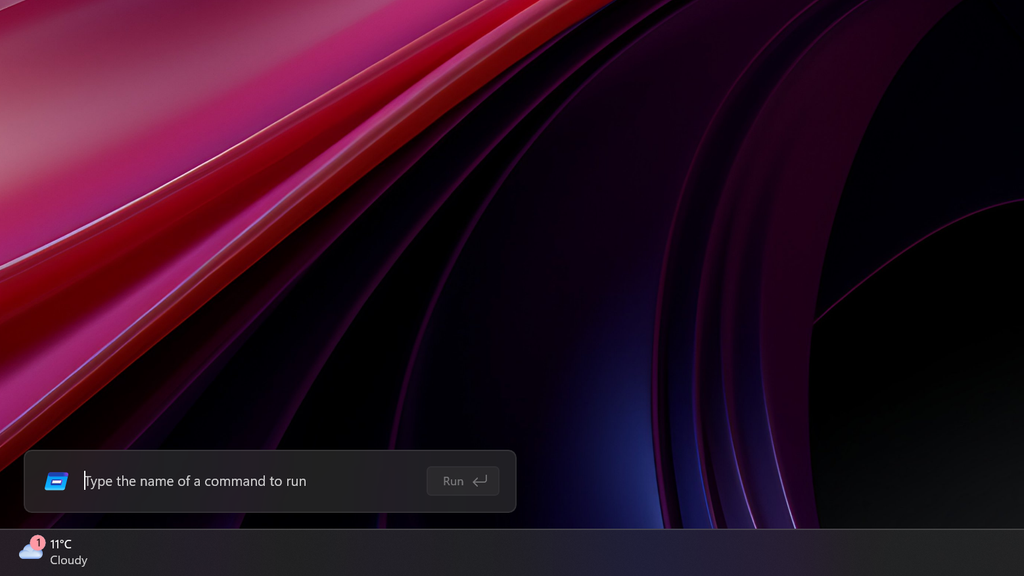 The new Windows Run box on the desktop above the weather icon on the Taskbar.