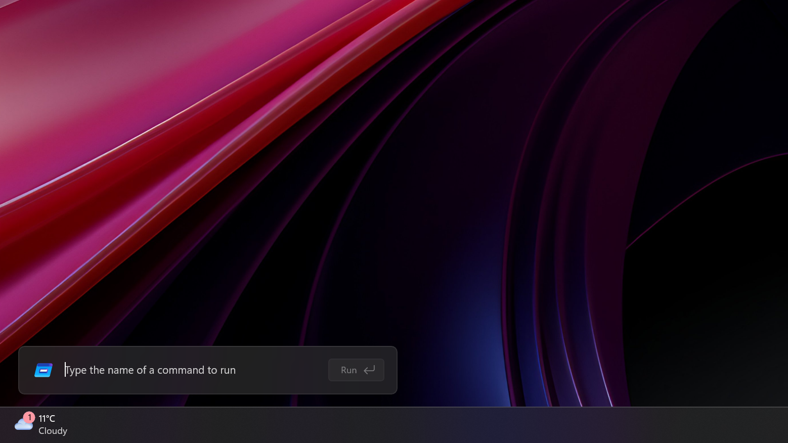 The new Windows Run box on the desktop above the weather icon on the Taskbar.