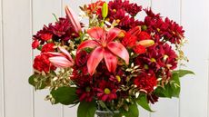 Christmas flower delivery: Red Mistletoe bouquet from Serenata Flowers