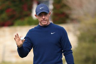 Rory McIlroy holds his ball up to the crowd during the final round of the 2025 AT&T Pebble Beach Pro-Am