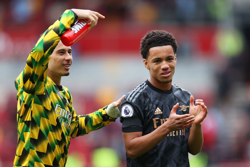 Manchester United target Ethan Nwaneri (R) of Arsenal applauds the fans next to Gabriel Martinelli following the Premier League match between Brentford FC and Arsenal FC at Brentford Community Stadium on September 18, 2022 in Brentford, England.