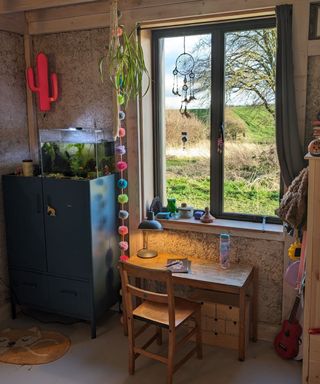 Natural hemp insulation seen in the walls of a study