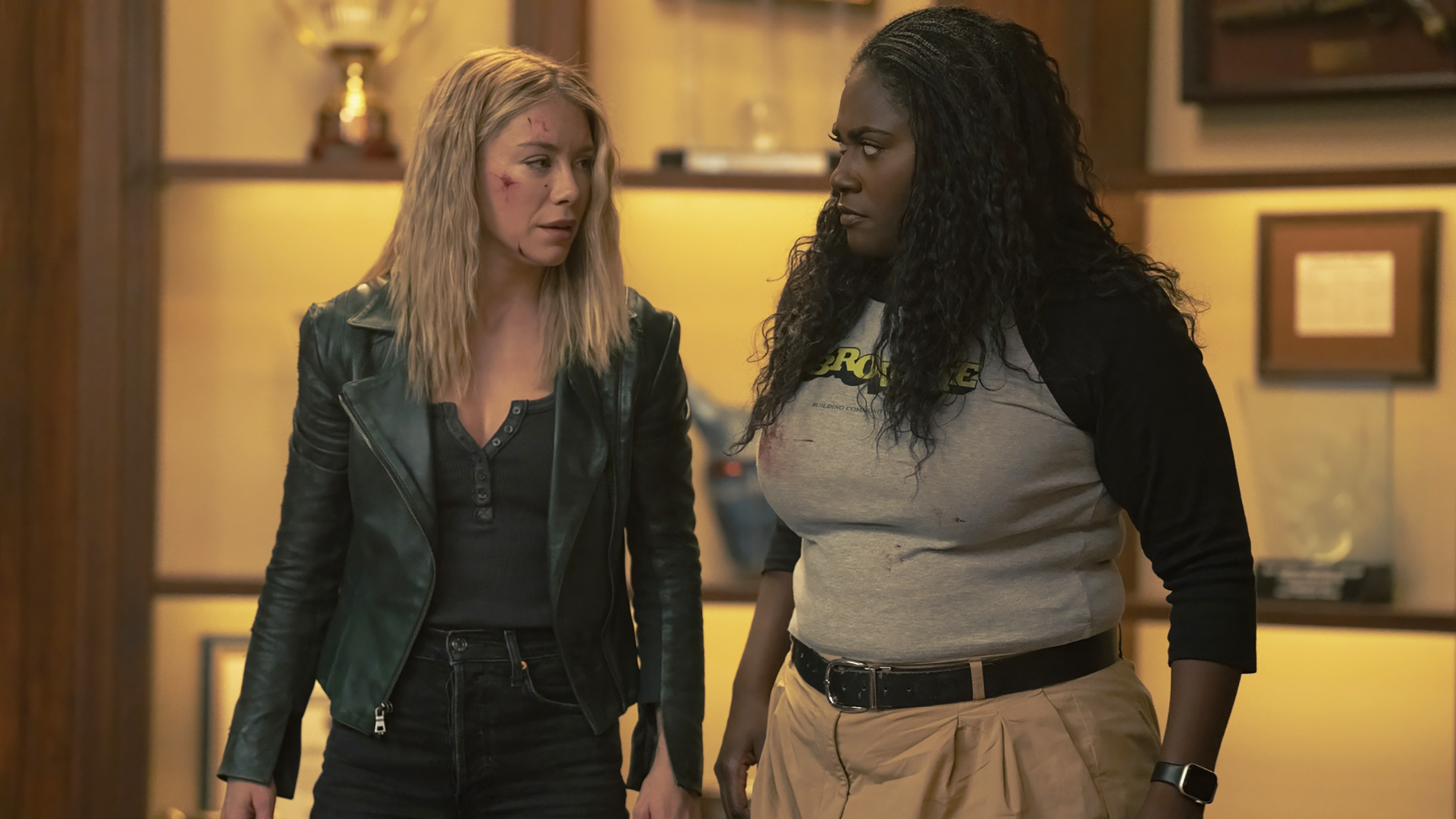 Emilia Harcourt and Leota Adebayo looking at each other in Peacemaker season 2 episode 7