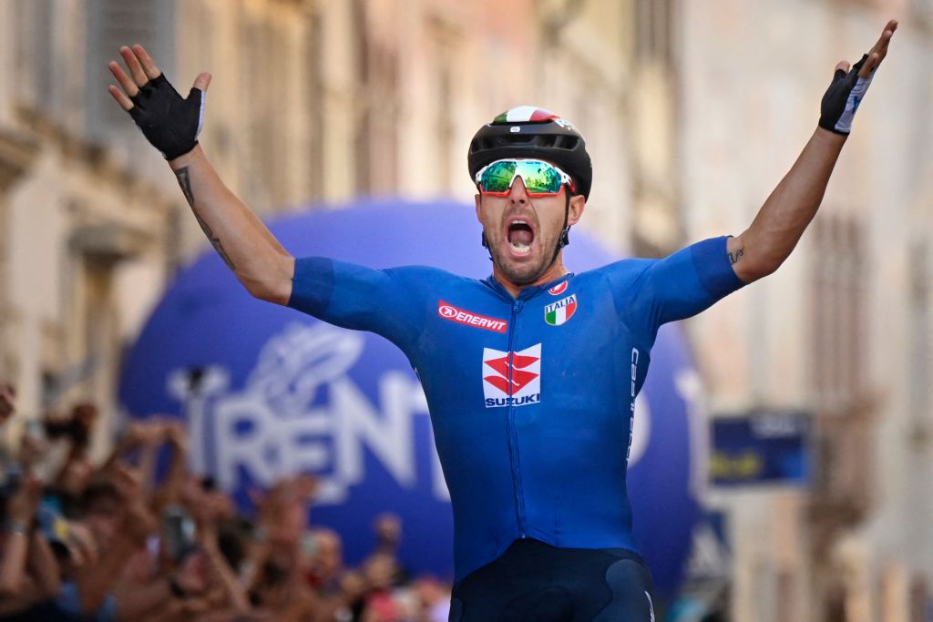 Italian Sonny Colbrelli reacts as he crosses the finish line and win the UEC European men Elite road cycling championships in Trento on September 12 2021 Colbrelli won the race ahead of Belgian Remco Evenenpoel placed second and France Benoit Cosnefroy placed third Photo by Alberto PIZZOLI AFP Photo by ALBERTO PIZZOLIAFP via Getty Images