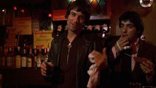 Robert De Niro in a bar in Scorsese's Mean Streets.
