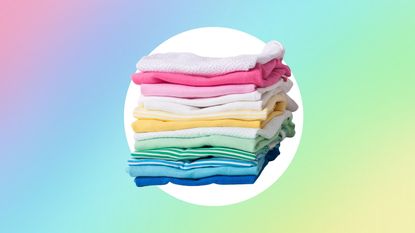A pile of colorful laundry on a rainbow background