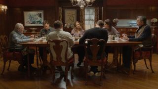 Side view of the Reagan family enjoying a dinner on Blue Bloods. 