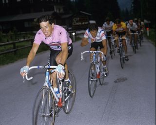 Eddy Schepers rides behind Stephen Roche on a valley road on the 1987 Giro d'Italia. The Belgian rode the same-sized frame as his leader.