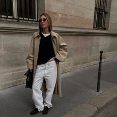 @hannahlewisstylist wearing a jumper, white jeans and trench