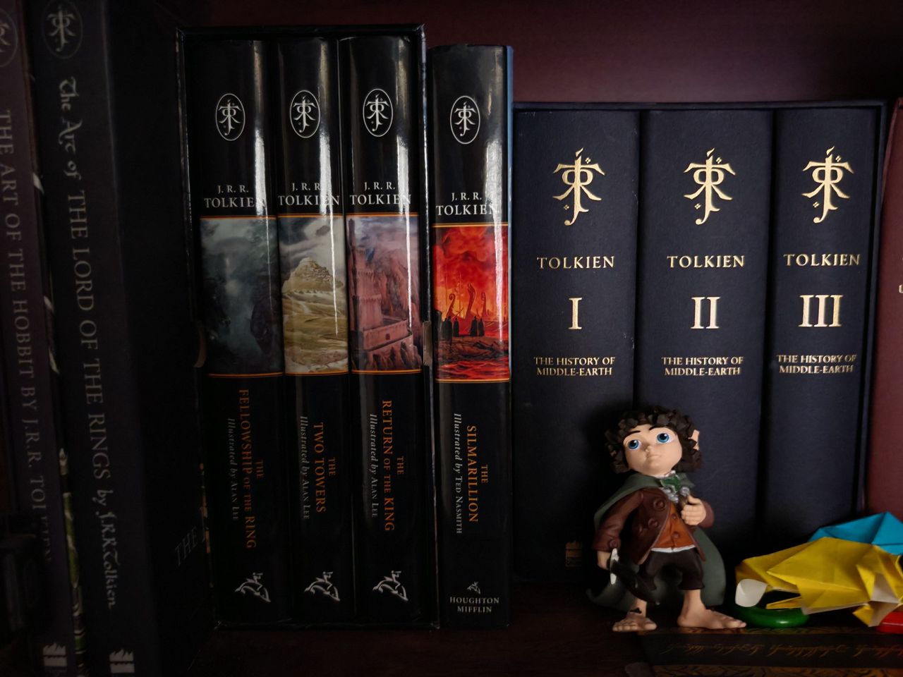 Photo taken with Porsche Design Honor Magic 6 RSR of bookshelf with Tolkien books