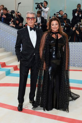 Pierce Brosnan and Keely Shaye Smith attend The 2023 Met Gala Celebrating "Karl Lagerfeld: A Line Of Beauty" at The Metropolitan Museum of Art on May 01, 2023 in New York City.