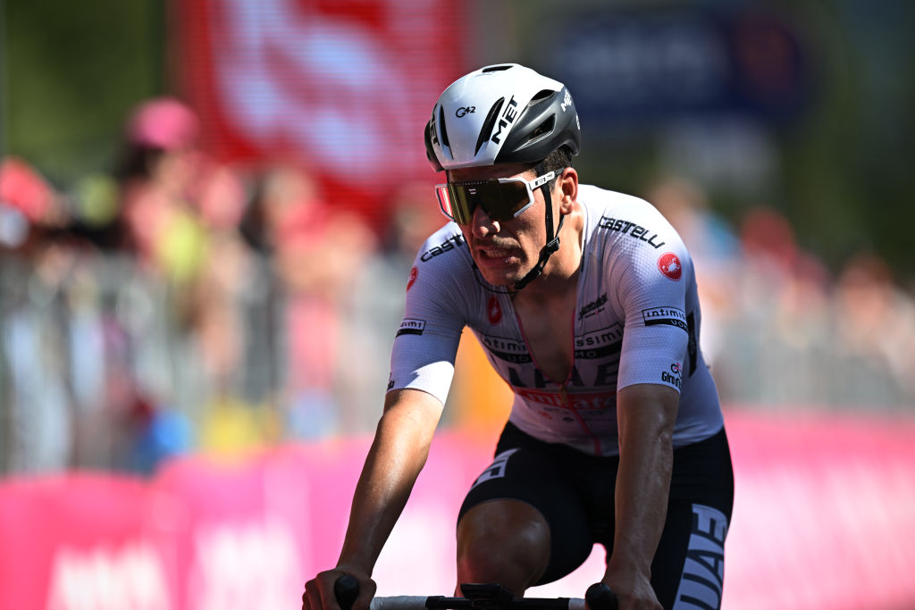 VAL DI ZOLDO PALAFAVERA ITALY MAY 25 Joo Almeida of Portugal and UAE Team Emirates White Best Young Rider Jersey crosses the finish line during the 106th Giro dItalia 2023 Stage 18 a 161km stage from Oderzo to Val di Zoldo Palafavera 1514m UCIWT on May 25 2023 in Val di Zoldo Palafavera Italy Photo by Stuart FranklinGetty Images