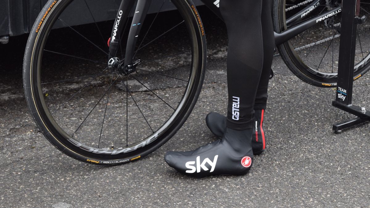 Chris Froome, who can suffer in cold weather, took no risks with overshoes, leg warmers and extra cold weather gear