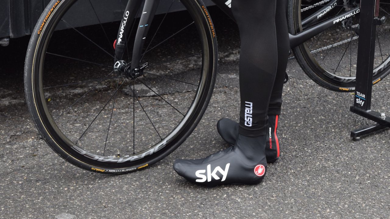 Chris Froome, who can suffer in cold weather, took no risks with overshoes, leg warmers and extra cold weather gear