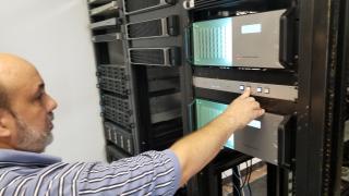  TCT Television VP of engineering Bruce Hart verifies the changeover switch between the broadcaster’s redundant Aveco master control automation systems is functioning as expected. 