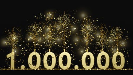 The number 1,000,000 in gold with sparklers on top of each numeral.