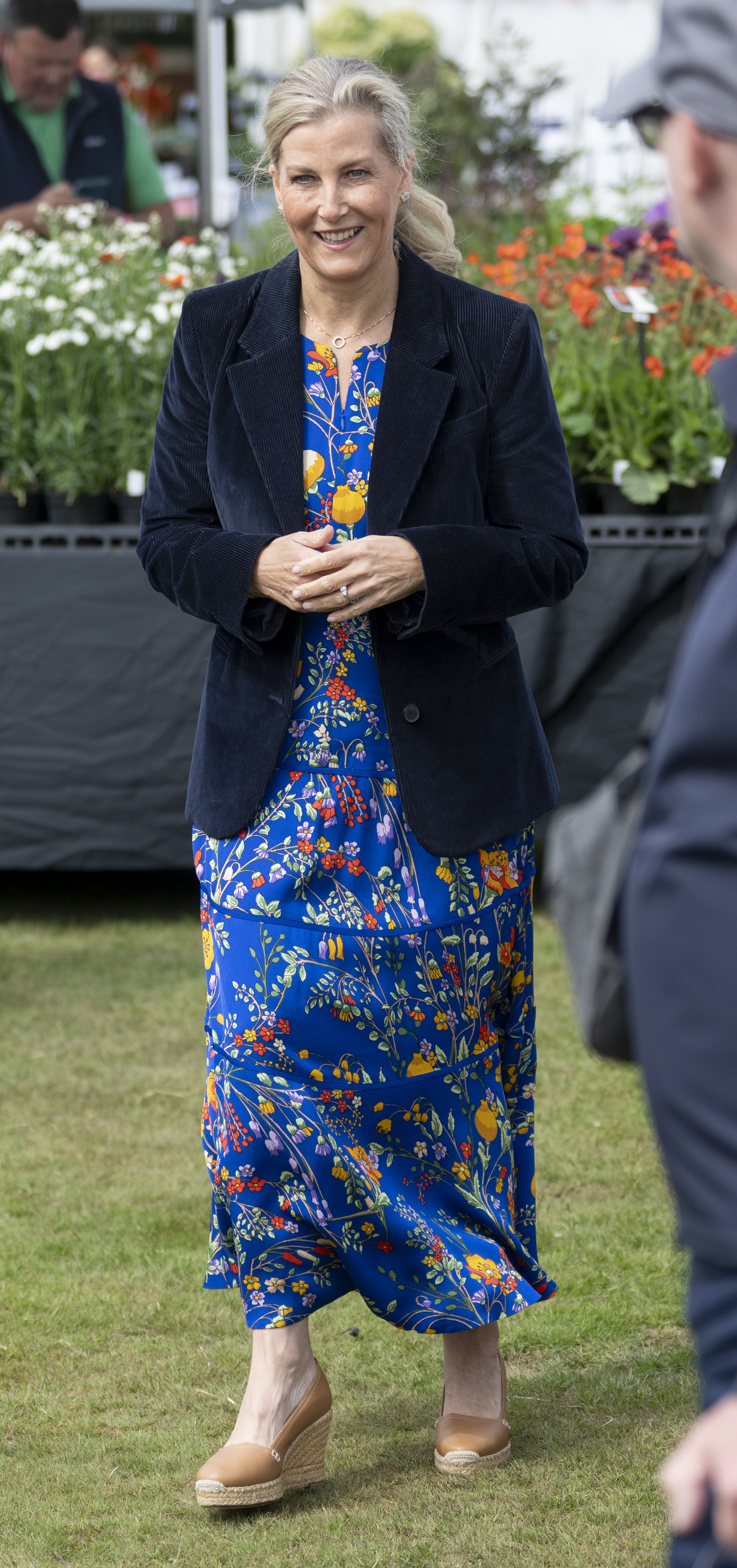 Duchess Sophie wearing a blue floral dress and blazer at a garden show