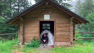 Craig Taylor setting up in an emergency shelter due to relentless storms in Germany’s Black Forest