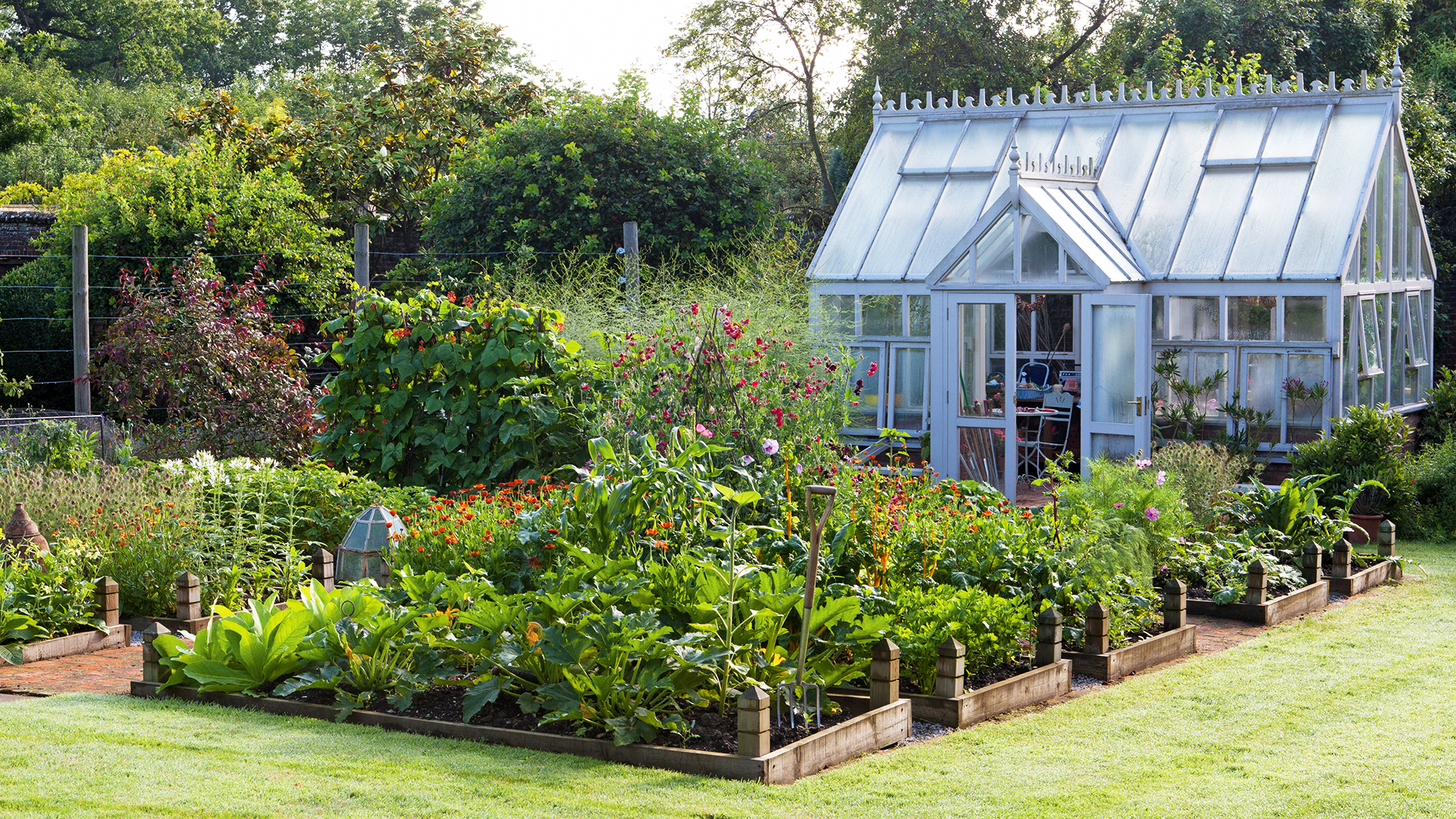 Glasshouse with raised garden beds