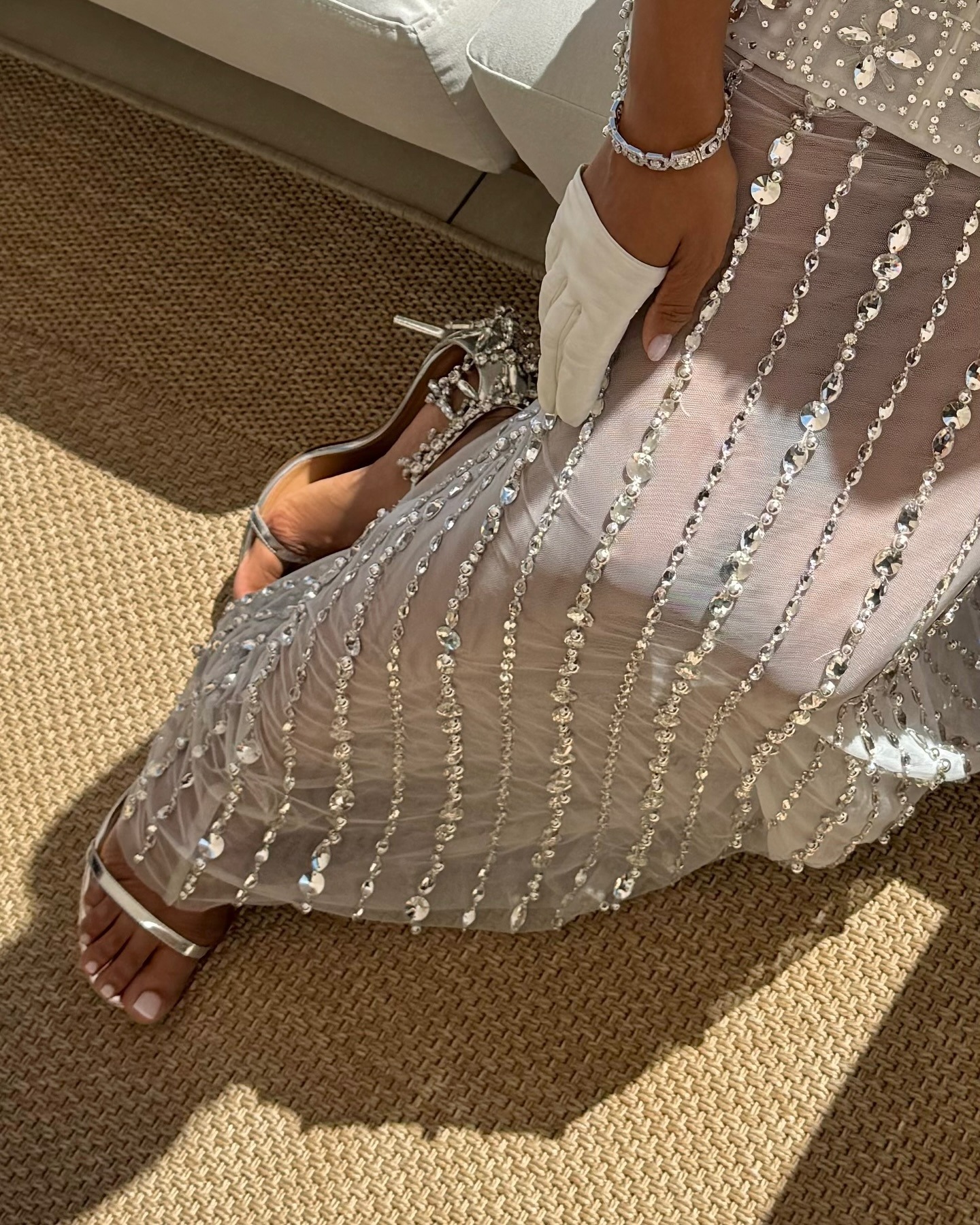 Rochelle Humes wearing a embellished dress and open-toed shoes with a milky pedicure