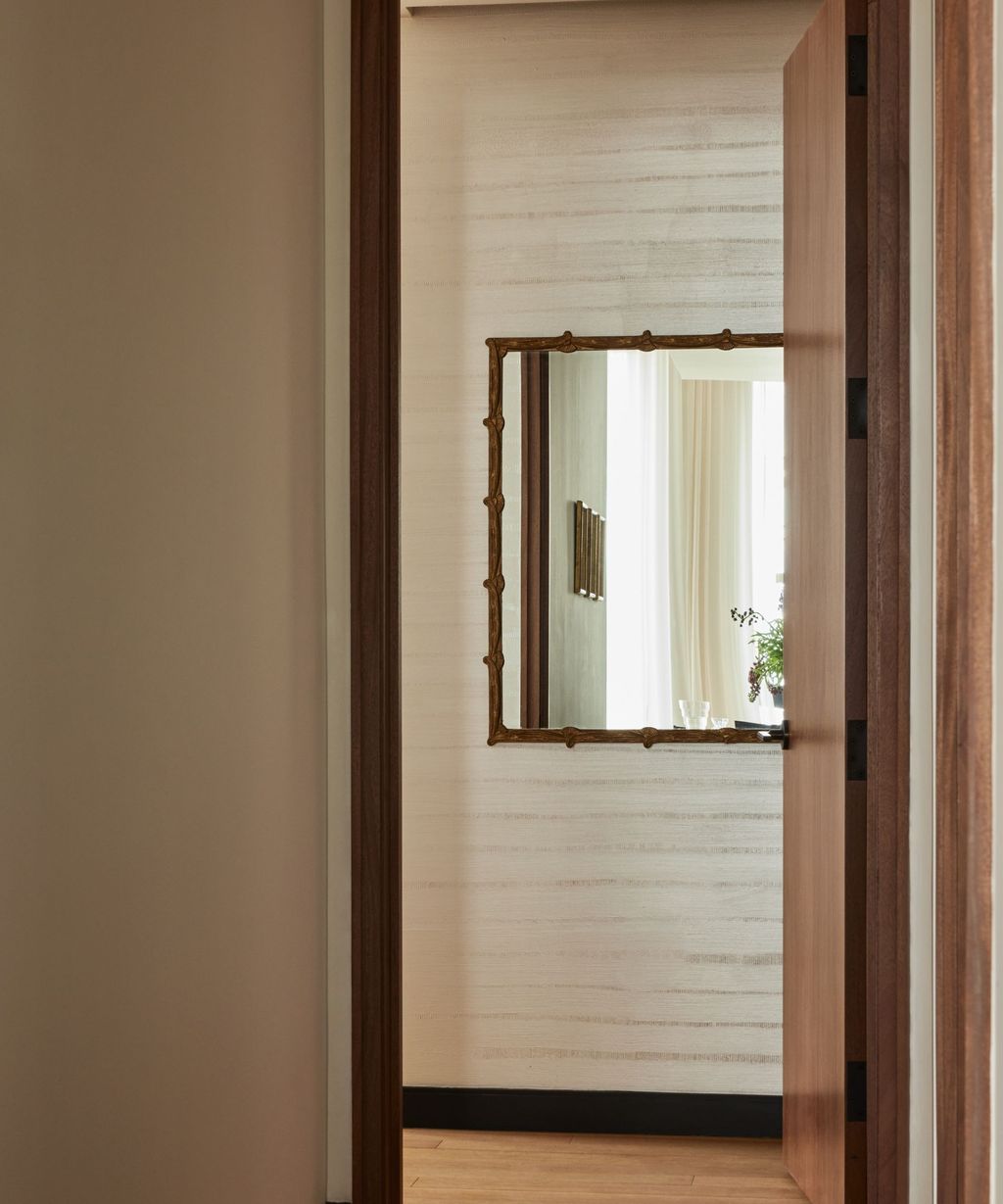 The best way to hang a heavy mirror according to the pros