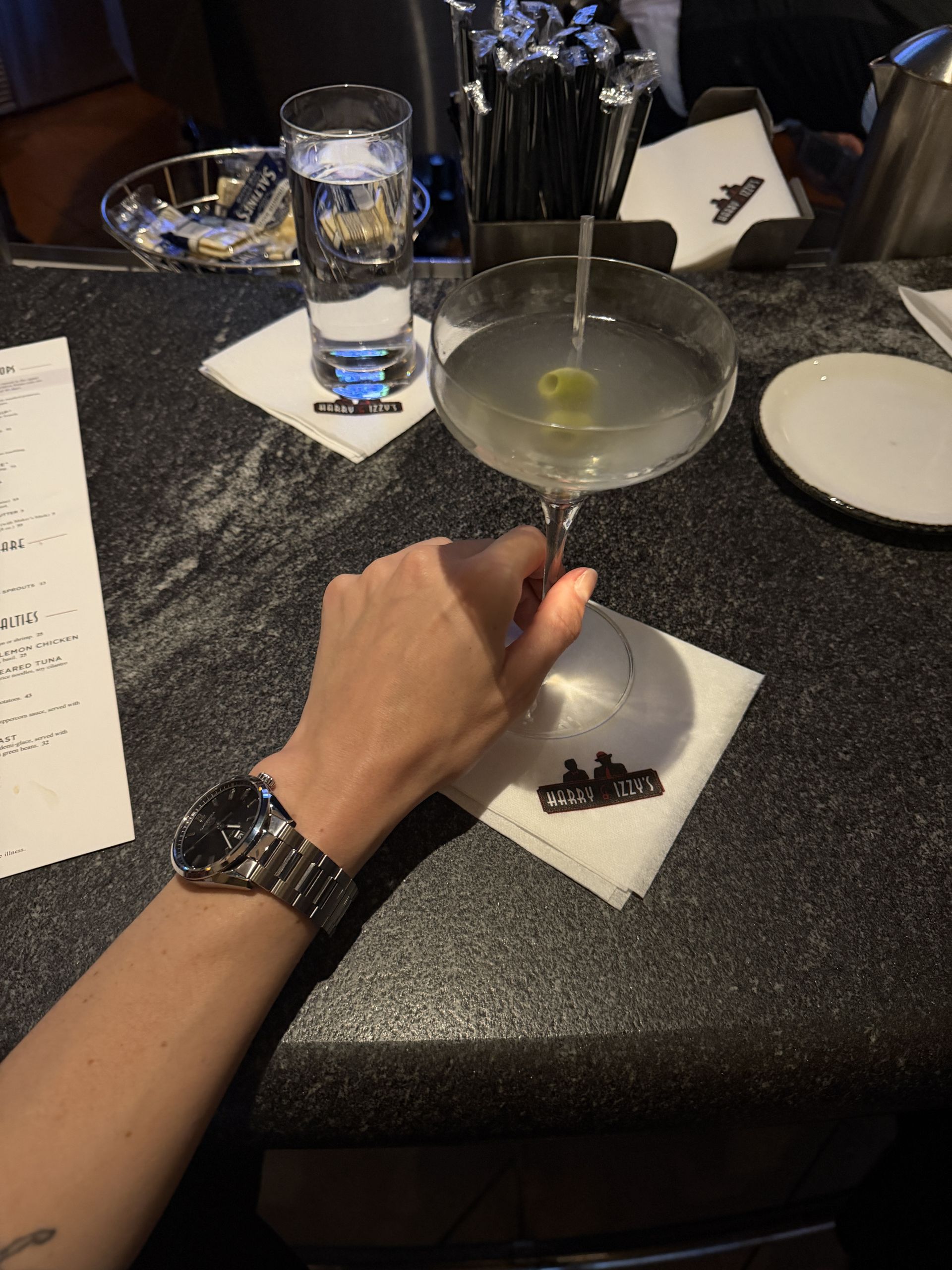 Eliza Huber drinking a martini at Harry & Izzy's in Indianapolis.