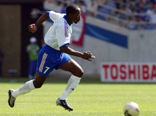 Claude Makelele in action for France against Denmark at the 2002 World Cup.