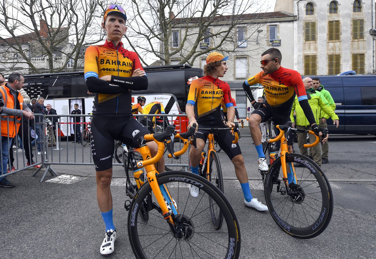 The Bahrain-Merida riders wait to sign on