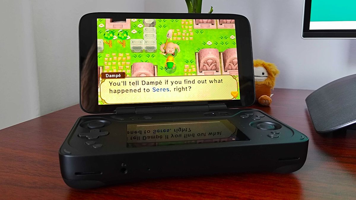 Ayaneo Flip DS handheld with Zelda: A Link Between Worlds gameplay featuring Link and Dampe on screen