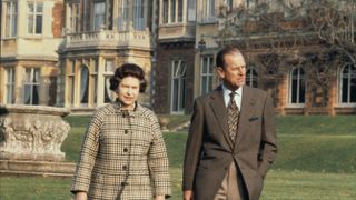 Queen Elizabeth and Prince Philip walking outside Sandringham House in February 1982